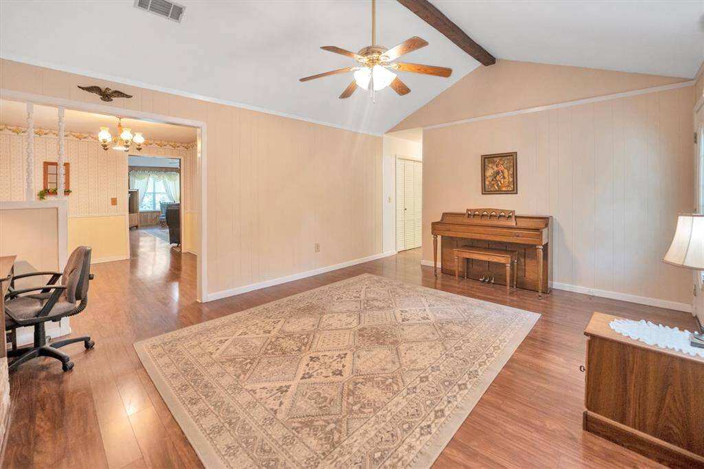 Living room at the front of the home at front door