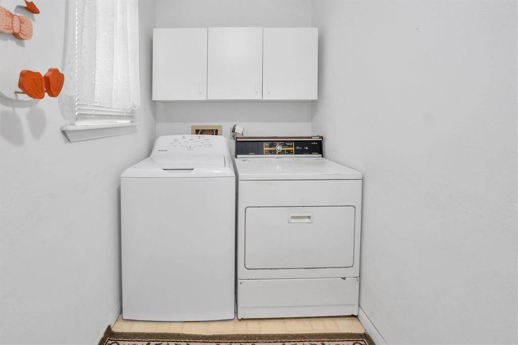 Utility room with large storage closet