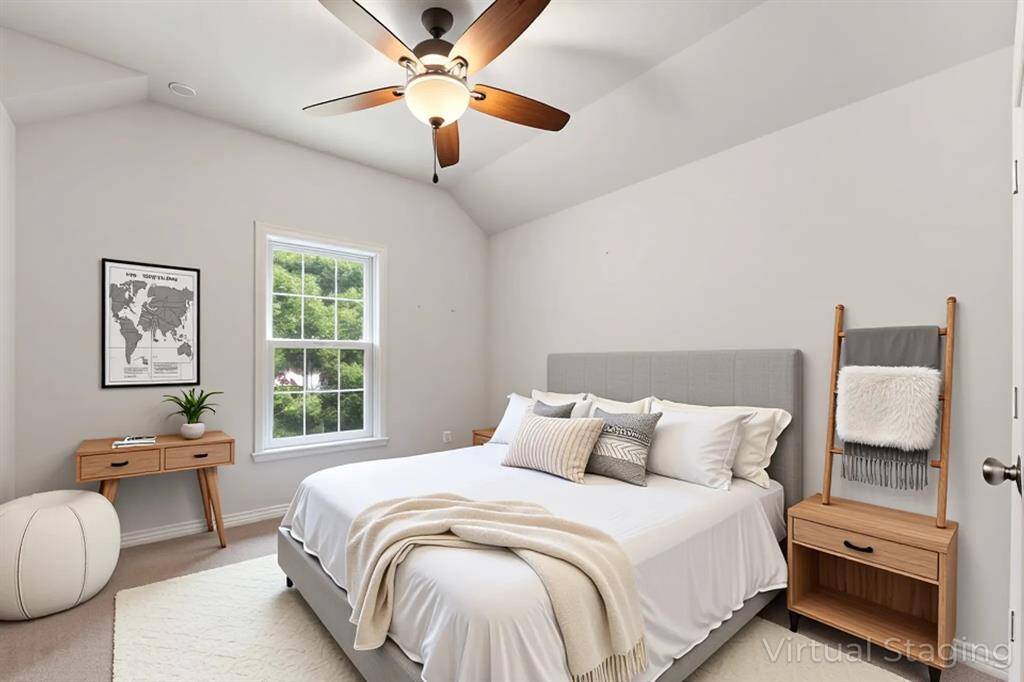 Make laundry day a breeze in this organized utility room. Featuring essential hookups, built-in shelving, and a hanging rod, this space is designed for efficiency and ease.