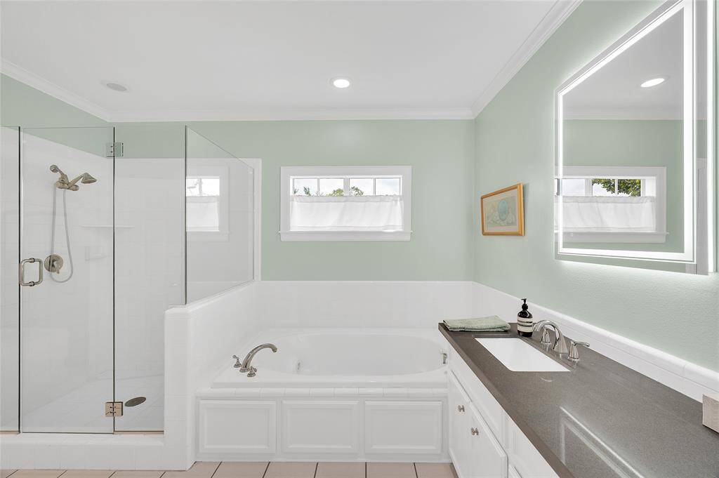 Jetted bath plus a large, seated shower