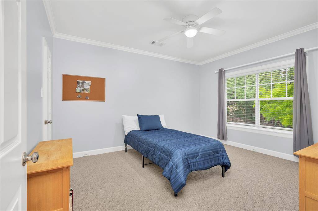 Third bedroom on second floor with front-yard view