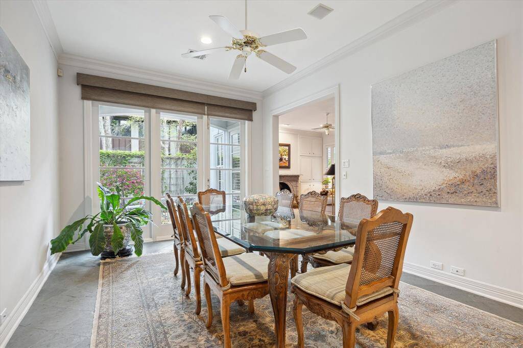 The beautiful breakfast room! Light-filled with side yard garden views. Your family will love hanging out here, drinking coffee, doing homework and sharing intimate meals.