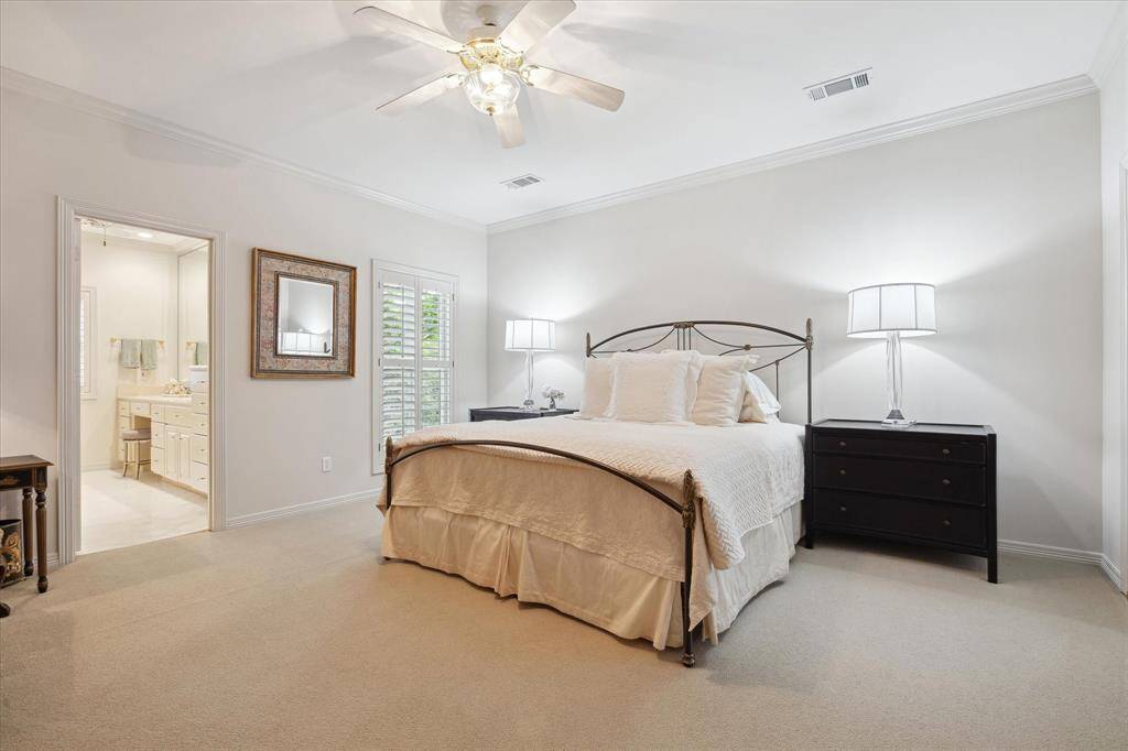 This oversized secondary bedroom is adjacent to the screened in balcony. Light and bright with walk-in closet.