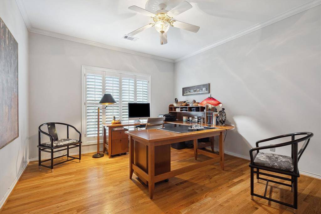 The second office - close to the primary bedroom and back stairway. Great for late night work sessions when you need to burn the midnight oil.