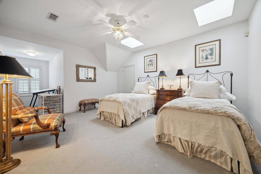 Third floor bedroom - private with its ensuite bath. Multiple storage closets and floored attic space. This can also be a flex room for your favorite hobby.