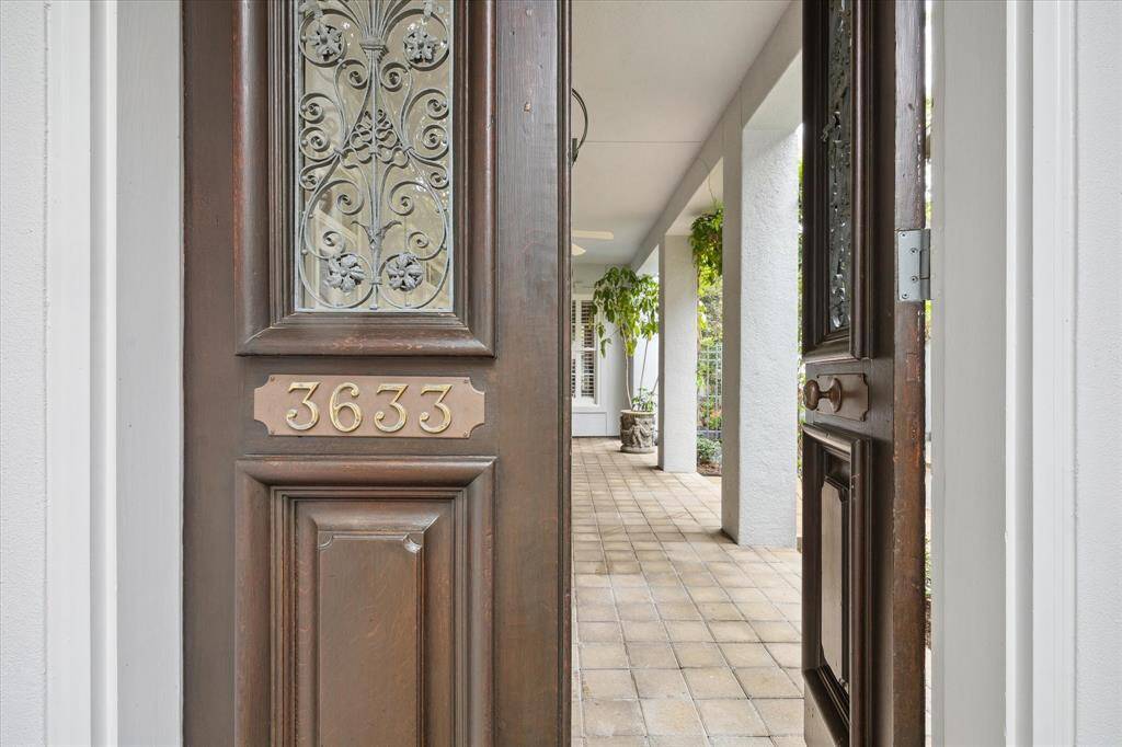 Step inside the double antique French doors to 3633 Overbrook!