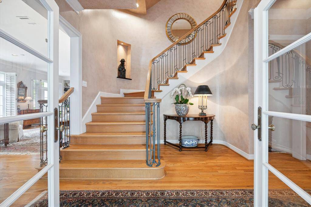 Overbrook’s entry with its hardwood floors and grand staircase.