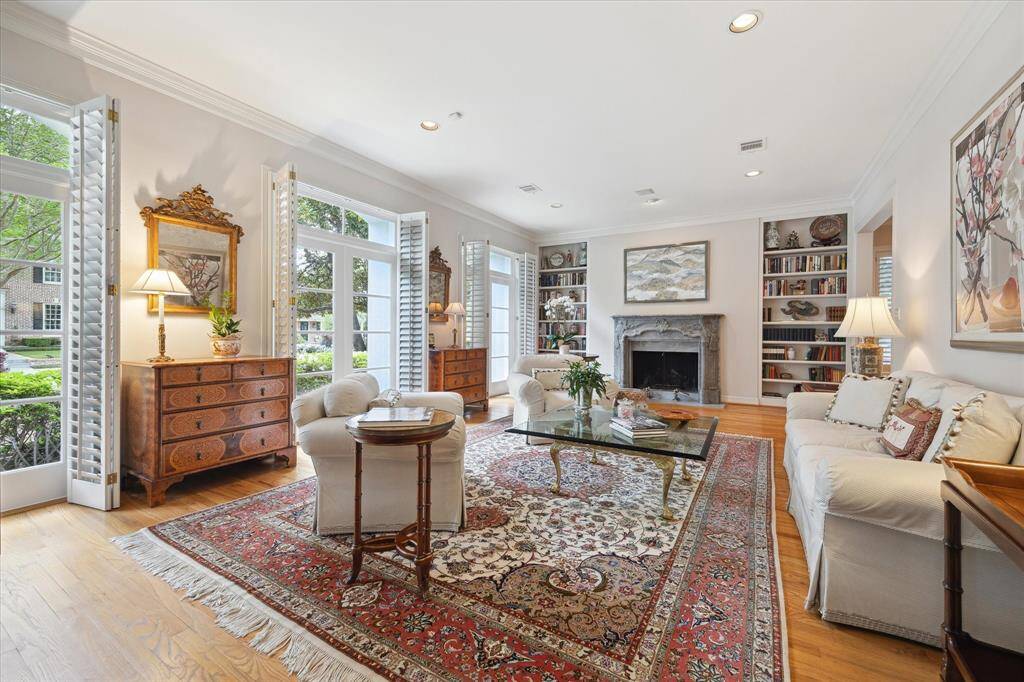 This room is large and lovely! So many options on how to use it. Notice the floor to ceiling windows and there’s plenty of room for a game table for afternoons of mahjong or canasta.