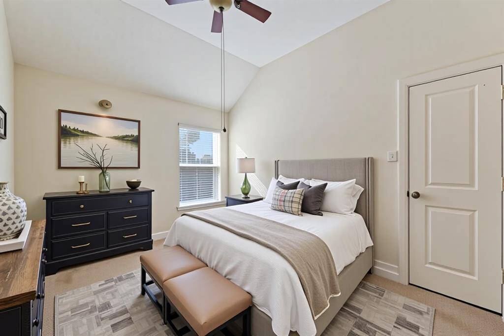 Virtually staged secondary bedroom.
