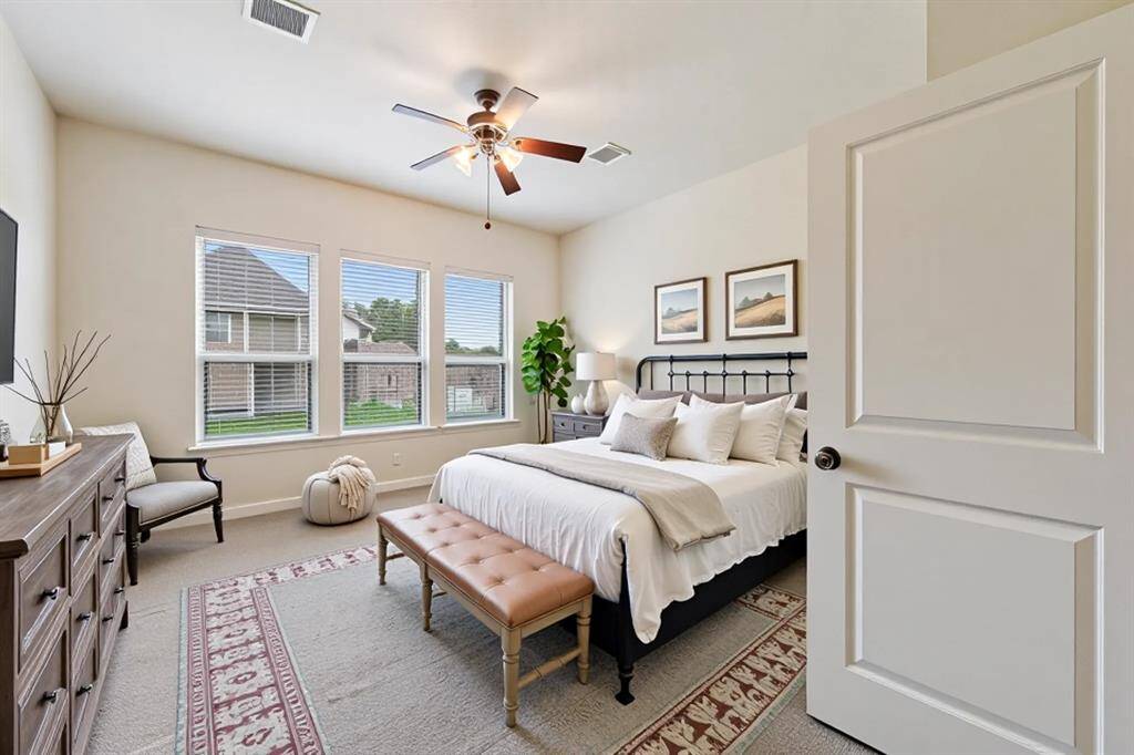 Virtually staged master bedroom.