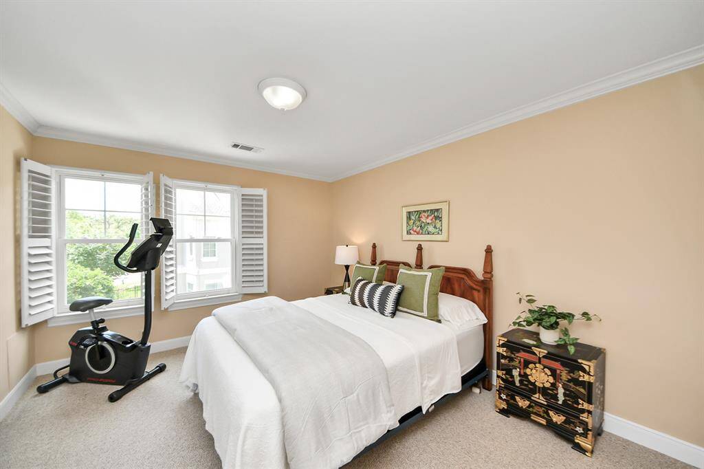 Now serving as a welcoming guest retreat, Bedroom 4 includes a spacious en-suite bath—ideal for overnight visitors or extended stays.