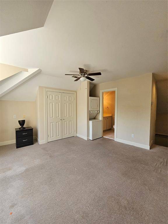 his charming garage apartment includes a generously sized bedroom, full bath with a step-in shower, its own washer and dryer, and a private entrance—perfect for extended stays.