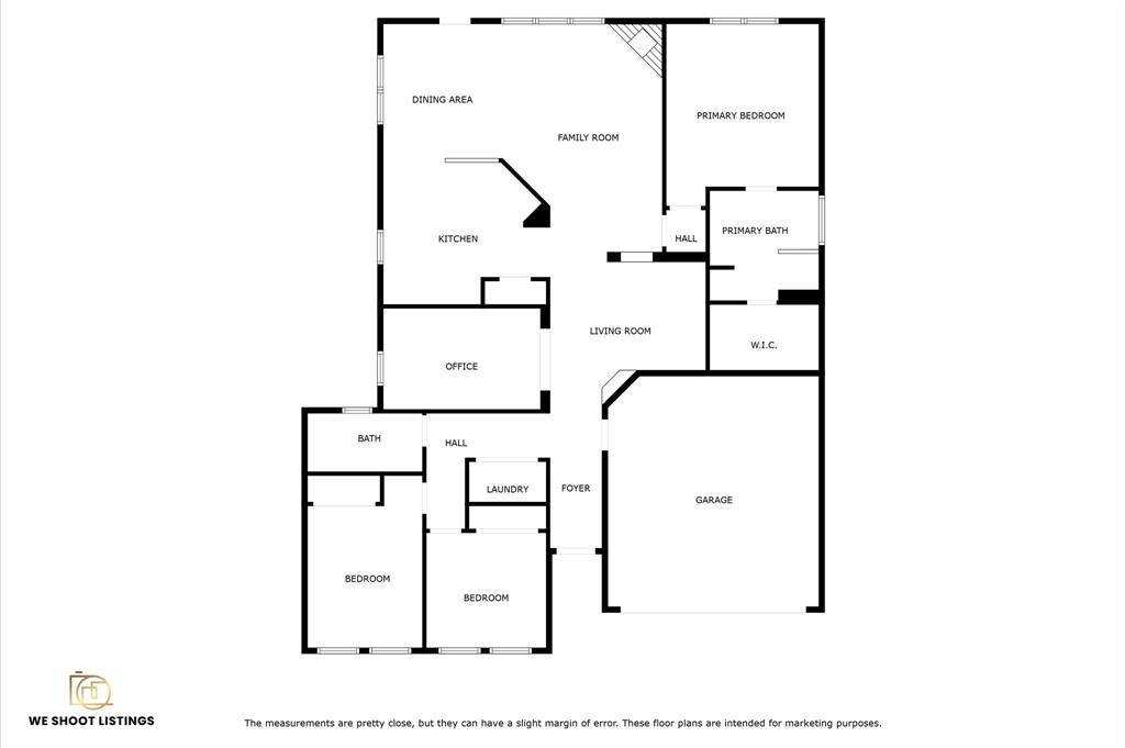 This floor plan features a spacious layout with a primary bedroom and bath, two additional bedrooms, and a shared bath. The open kitchen connects to a dining and family area. There's also an office, laundry room, living room, and a two-car garage.