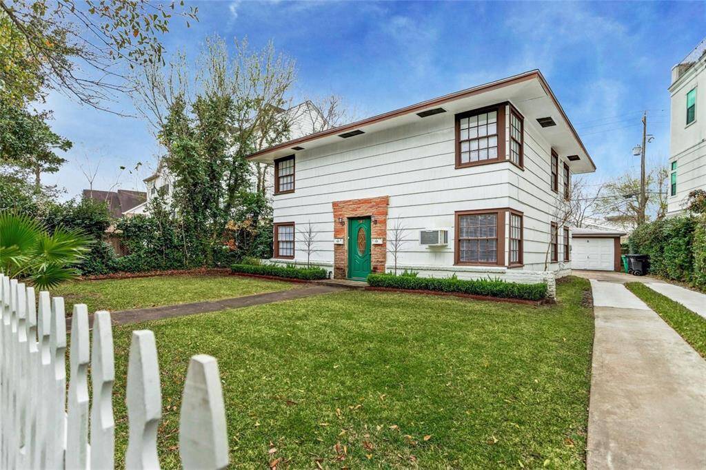 From the white picket fence & lush green yards (front and back) to the detached garages and abundant parking! This duplex is wonderful place to call home! This unit is the ground floor home, recently renovated and ready to move right in!
