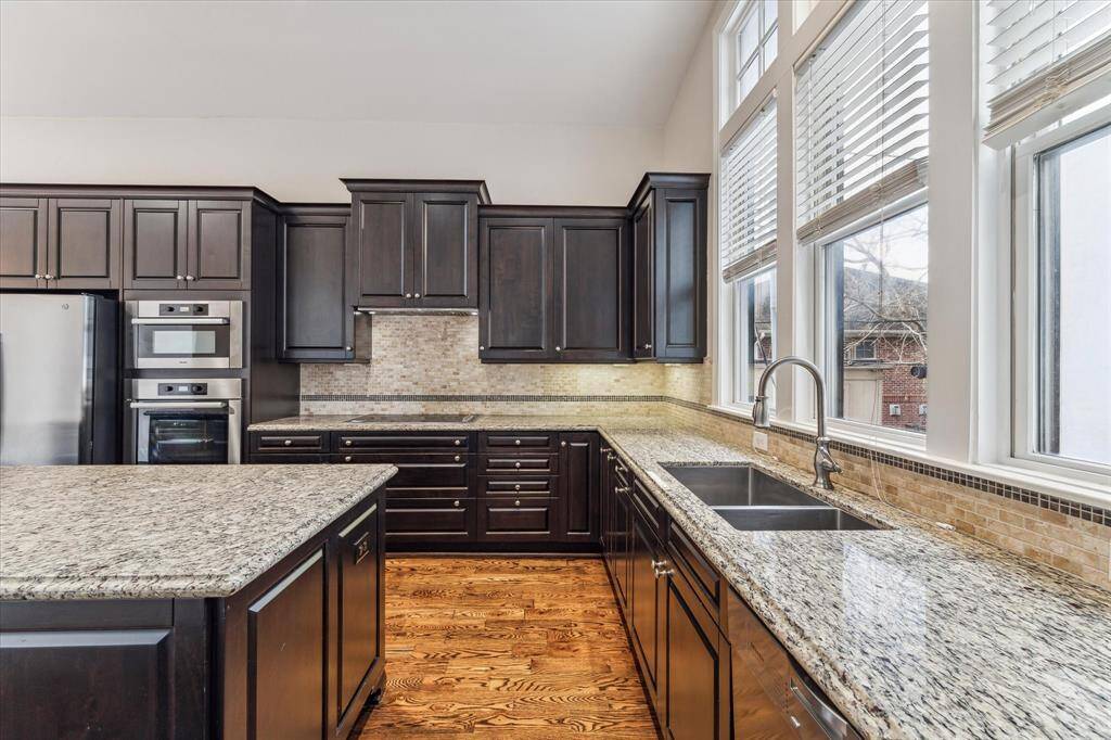 Lots of storage and natural light in the kitchen