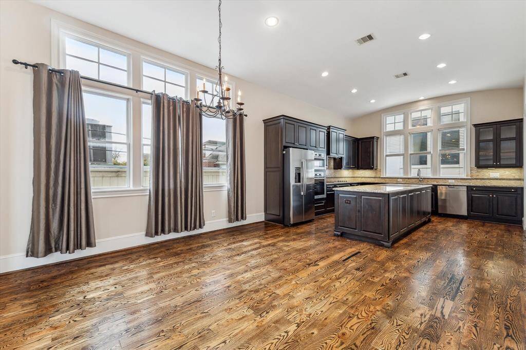 View of the kitchen from the living spaces