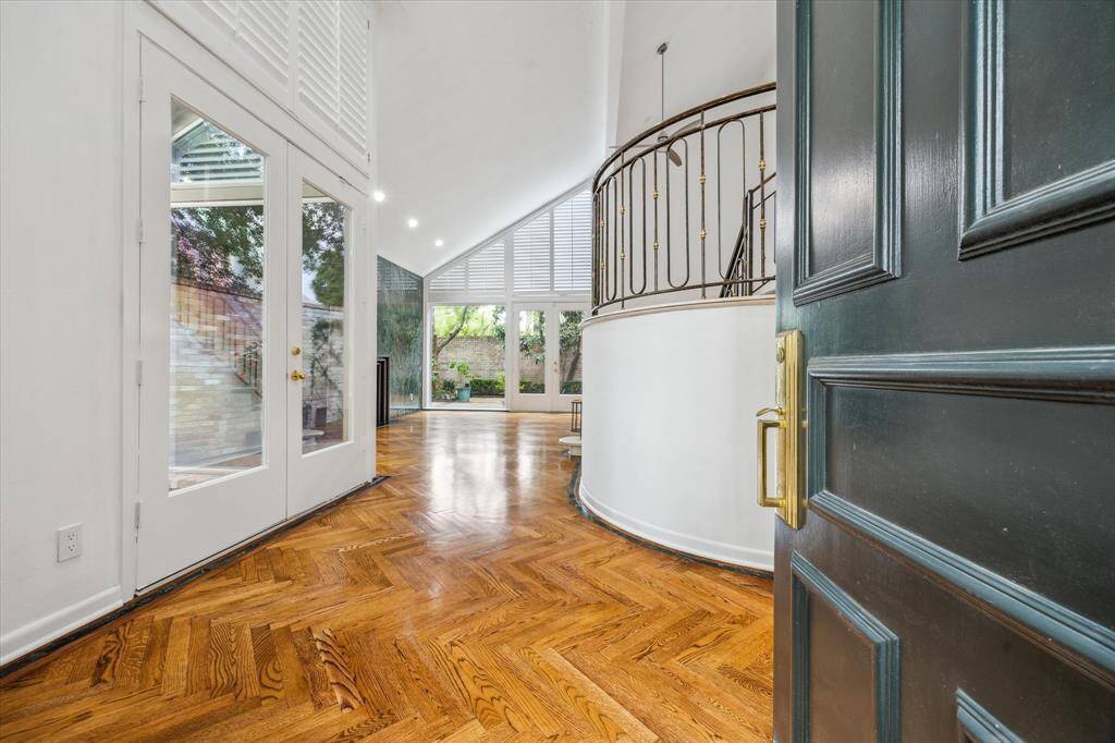 Upon Entering This Grand Townhome, The Herringbone Wood Flooring Has Been Completely Refurbished. Sleek Lines Seen Throughout This Well Designed Townhome.