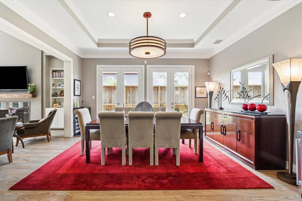 stunning dining room with side patio views