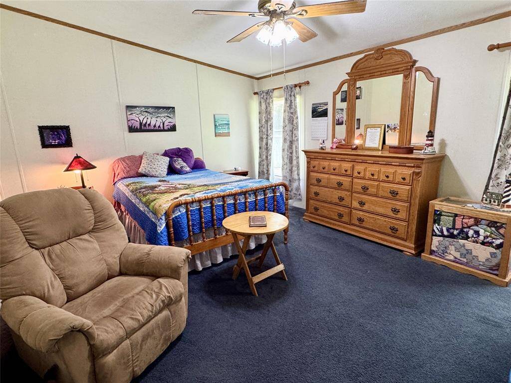 Approx 16x13 primary bedroom with 6x5 Walk-in closet and private bath.