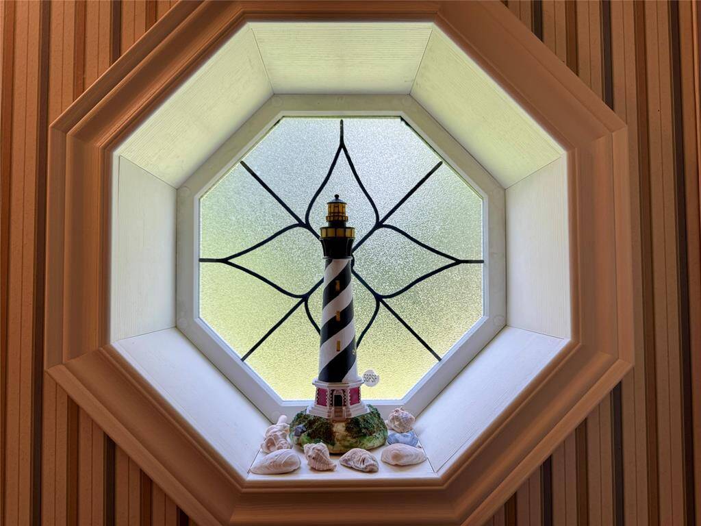 I love this little window in the half bath!