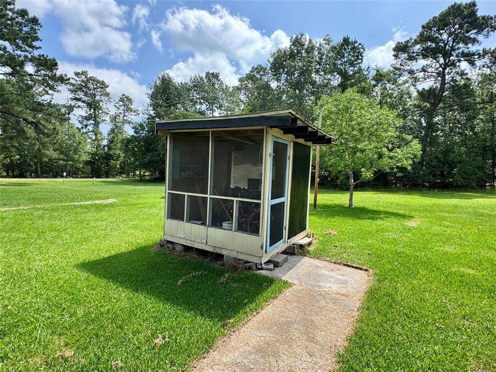 The previous owner used this as a greenhouse and the current owner used it as a play house. The black painted area is coated for CHALK art. :)