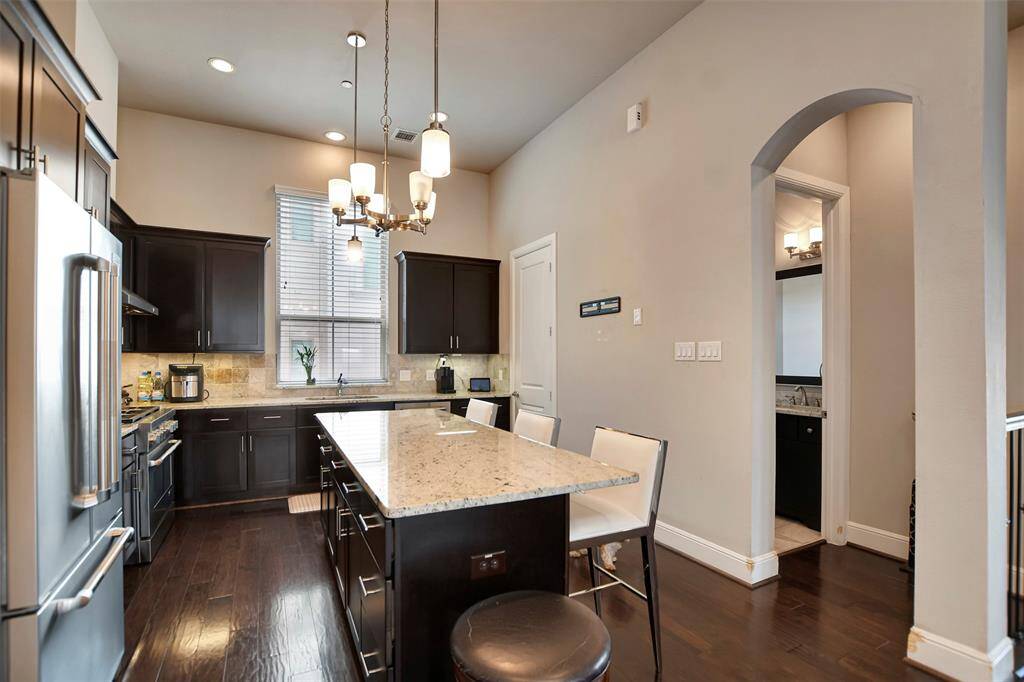 Your dream kitchen. Large island with lots of drawers, natural light, delicate countertops, high end appliances and more.