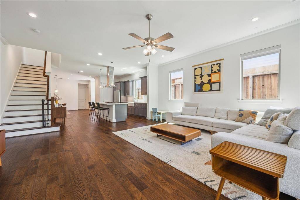 Alternate angle, looking towards the Kitchen. The large windows allow plenty of natural light to come in. The Living Room is prewired for surround sound speakers.