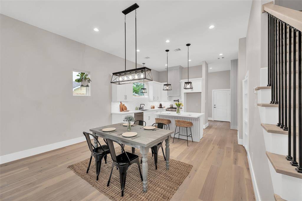 Engineered wood flooring throughout