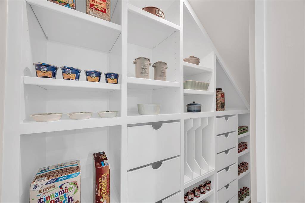 Custom built pantry with adjustable shelves and soft close drawers