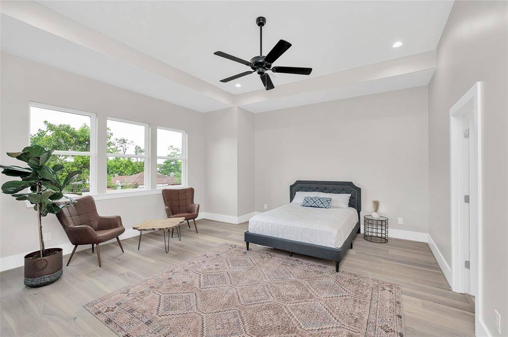 This primary bedroom is larger than some studio apartments