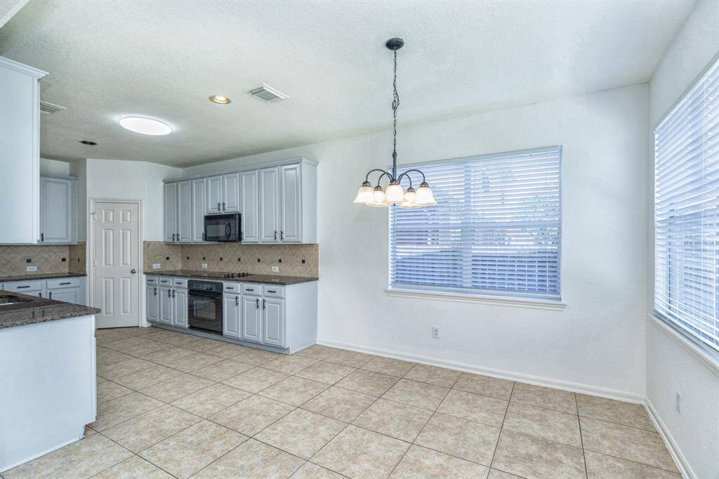 Kitchen overlooked family room
