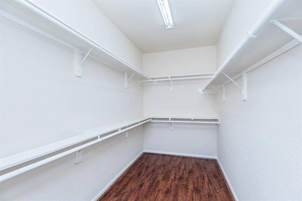 Spacious Gameroom upstairs with wood floor