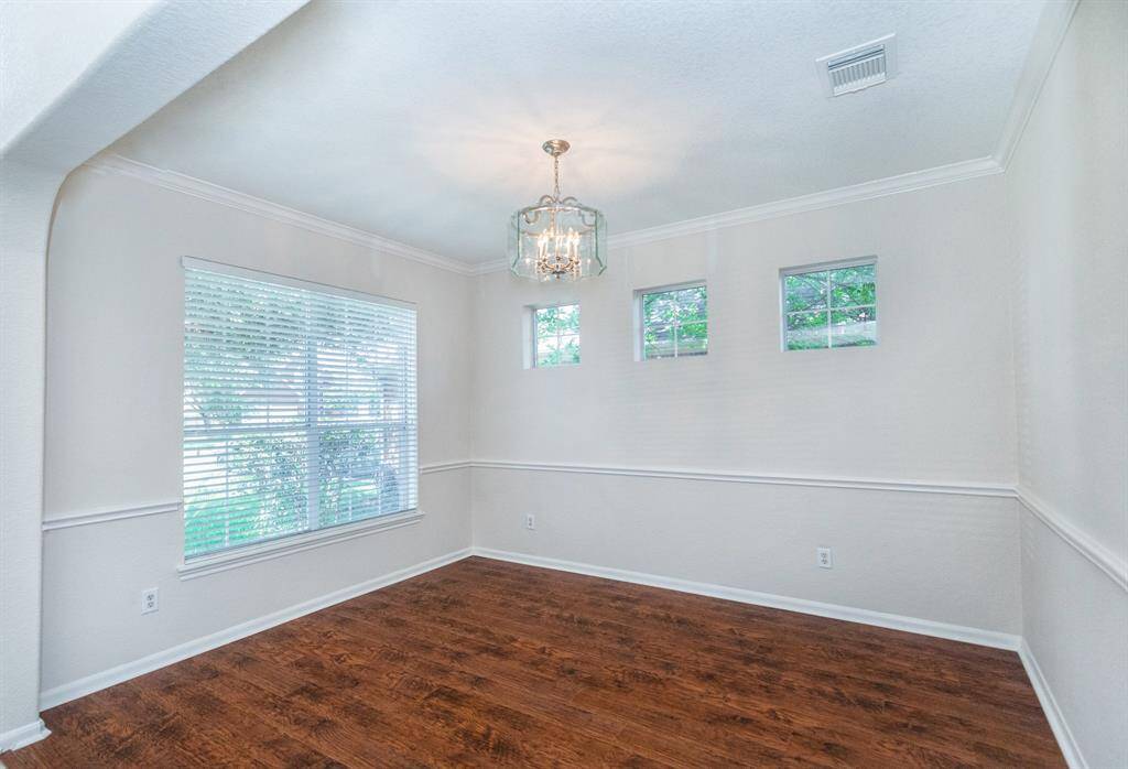 Tiled Family room has cozy fireplace