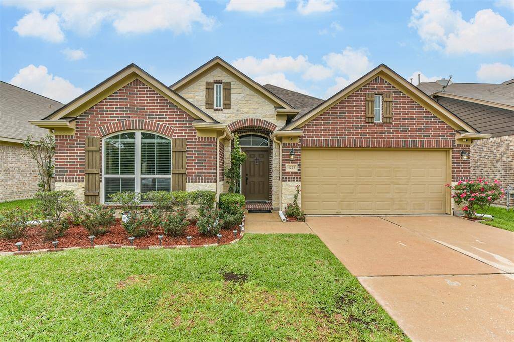 A one story home featuring 4 bedrooms and 2.5 baths.