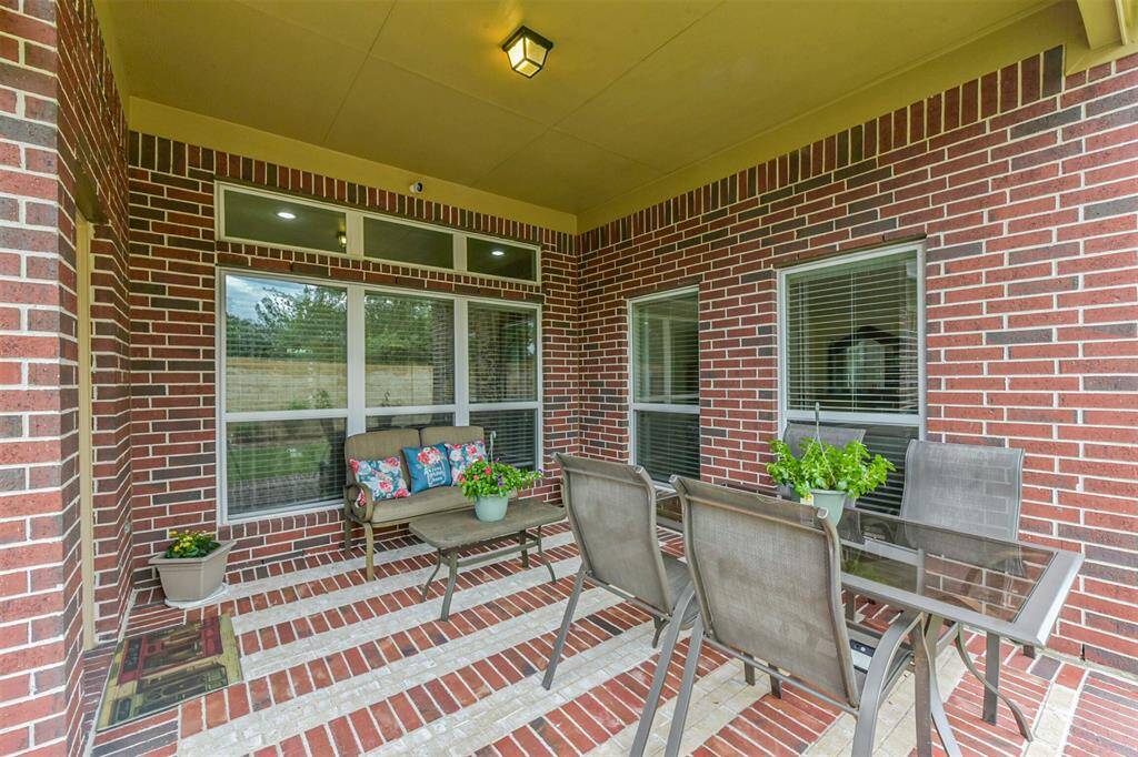 Enjoy meals or drinks outside in this upgraded patio.