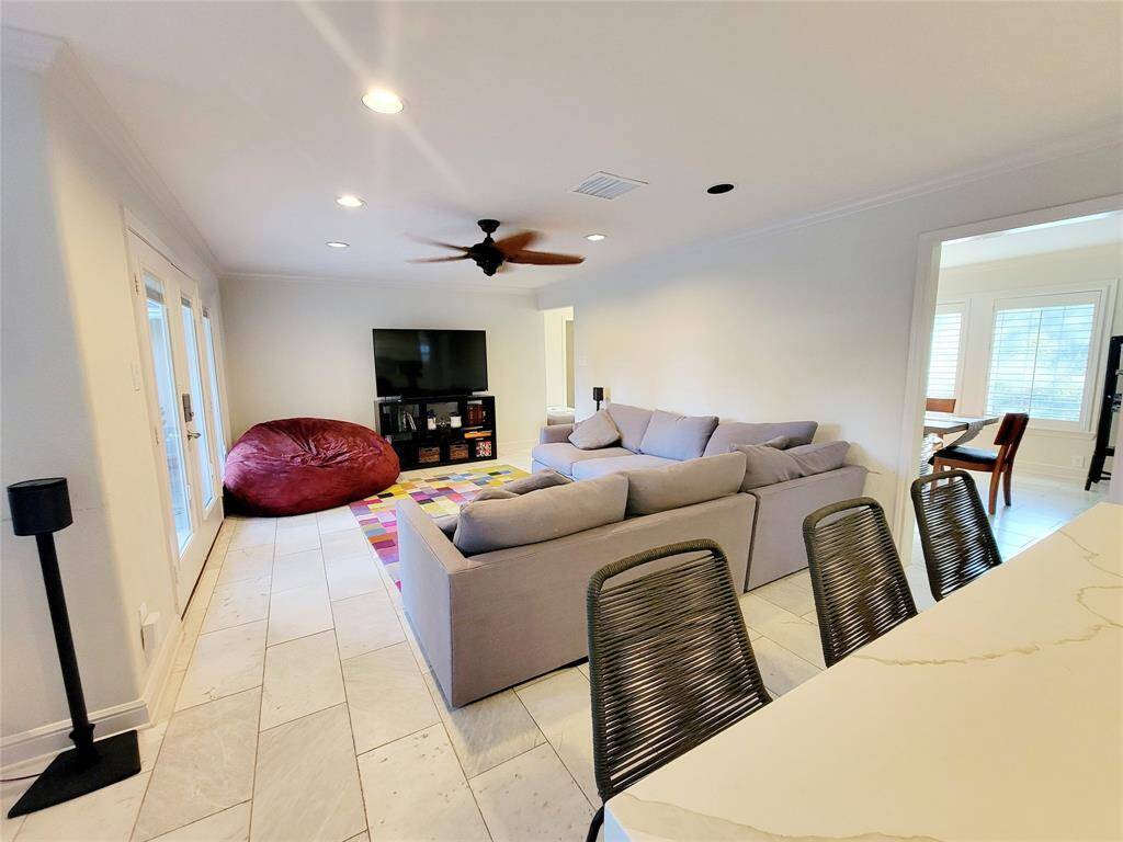 kitchen opens to family room.