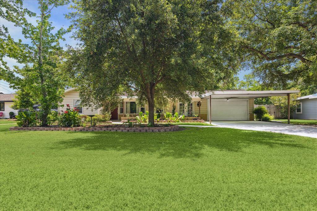 Massive 12,160 SF in lot in Brook-Woods Estates with mature trees and so much potential