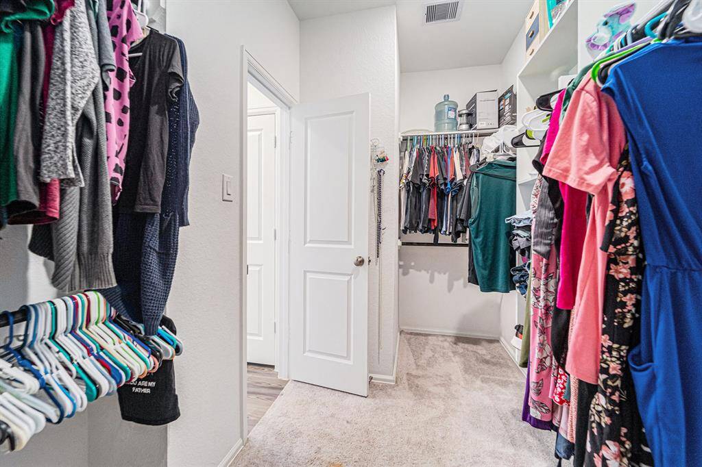 Walk in Closet with Access to Laundry Room
