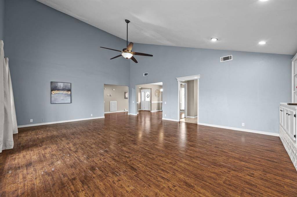 Experience seamless living with a spacious open floor plan and elegant laminate flooring perfect for entertaining.