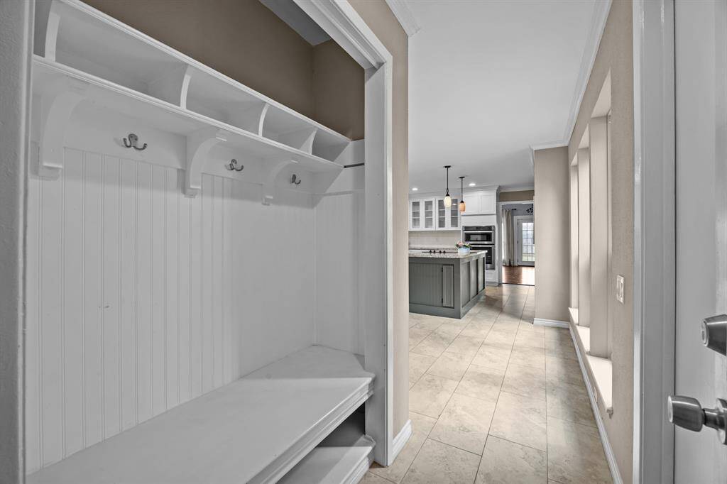 Convenient mudroom off the garage, ideal for all your family's needs.