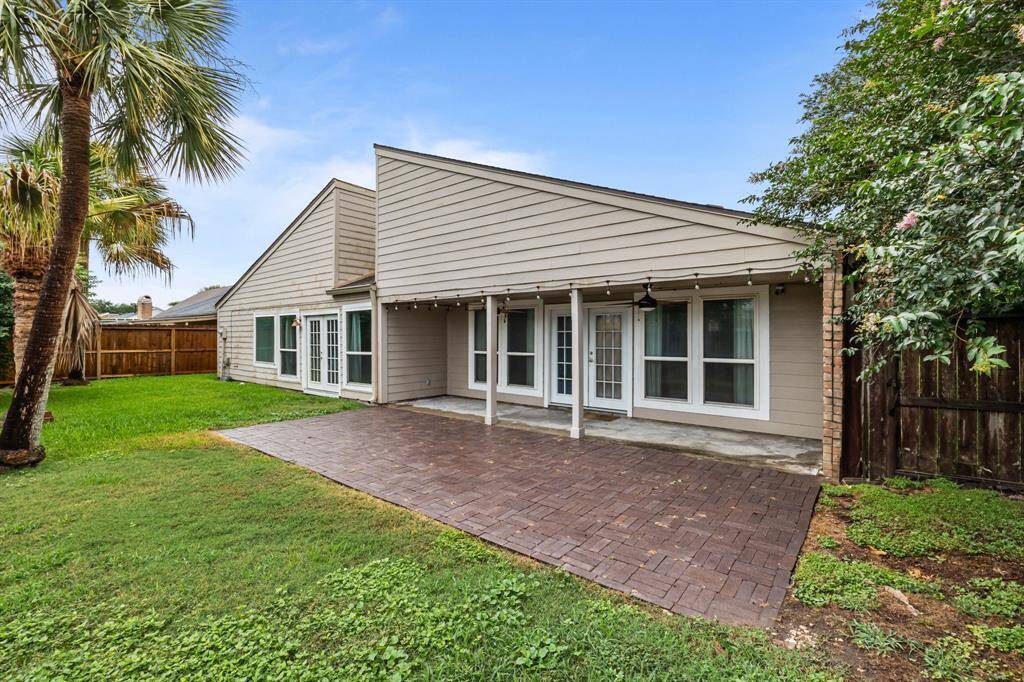 Enjoy endless summer fun in this spacious backyard oasis.