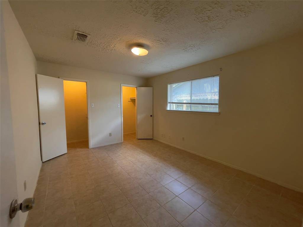 1st Secondary bedroom with 2 separate closet spaces.