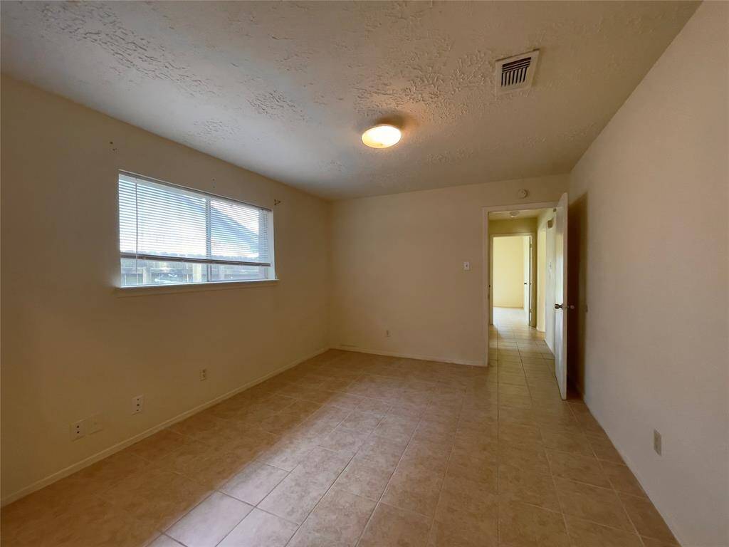 Another view of the 1st secondary bedroom.