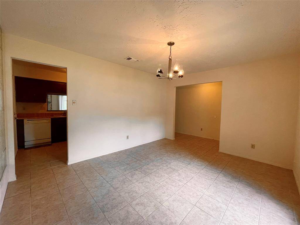 Another view of the formal dining room. The left doorway leads directly to the kitchen.