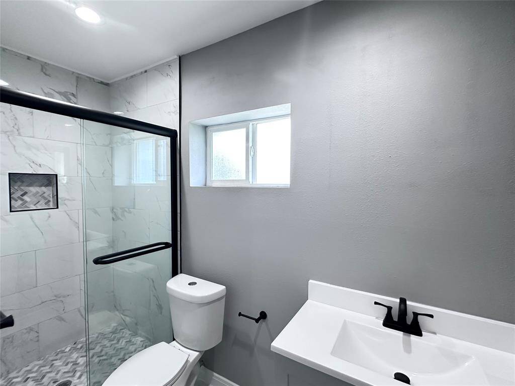 Front bathroom with private bath and clostet area