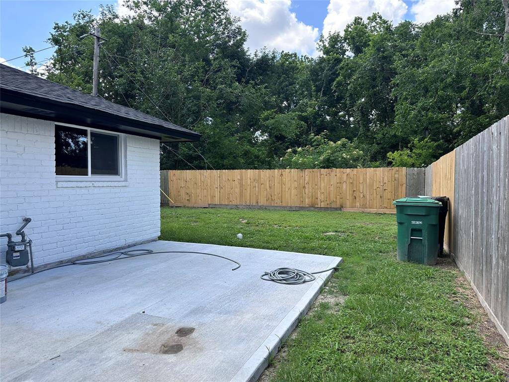 Spacious backyard with added privacy fence, no neighbors, and patio for entertaining.
