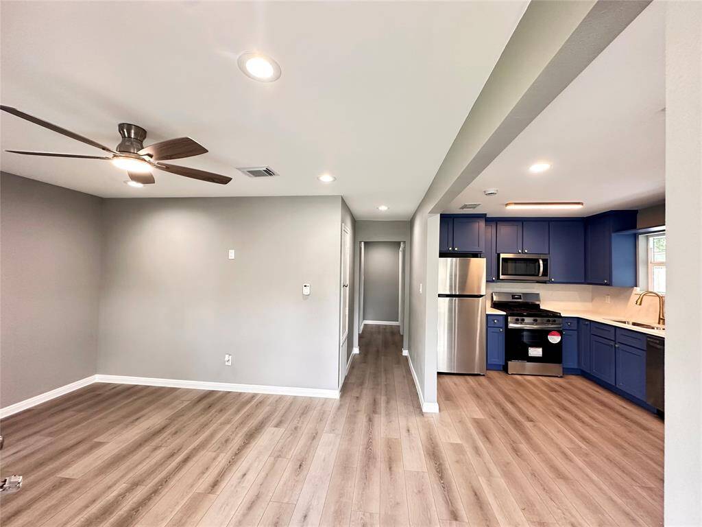Living, kitchen and hallway.