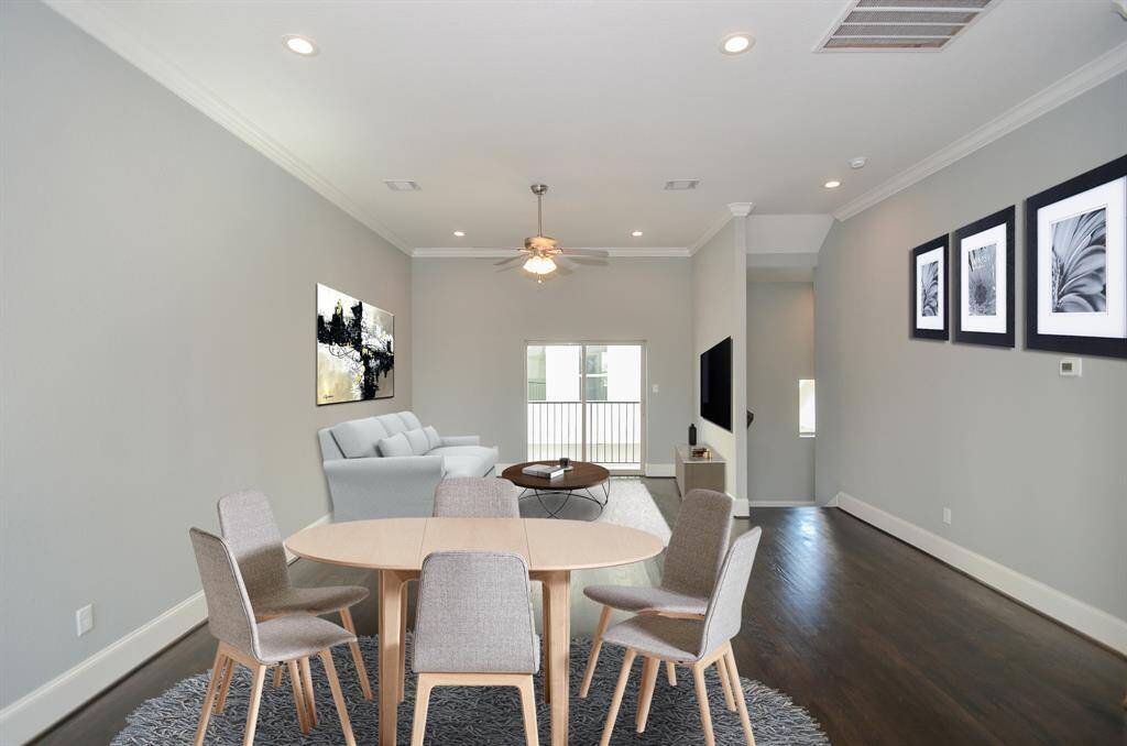 Photos from previous listing.Virtually staged living and dining area.