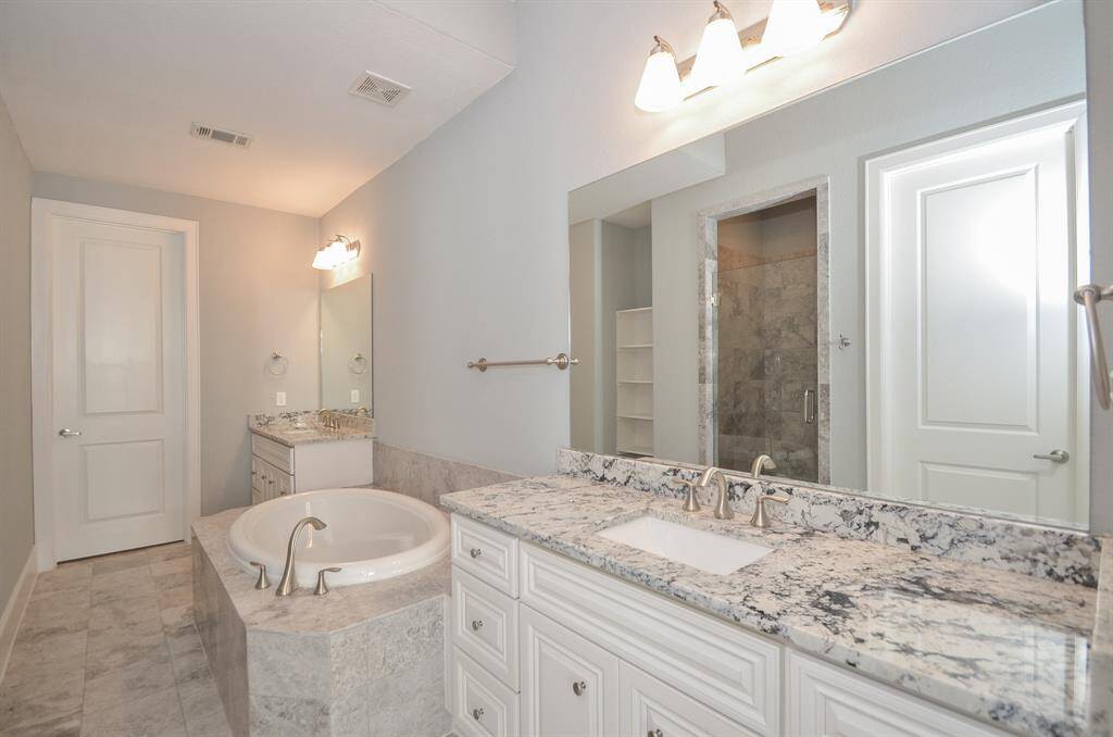Enjoy another view of the master bathroom.