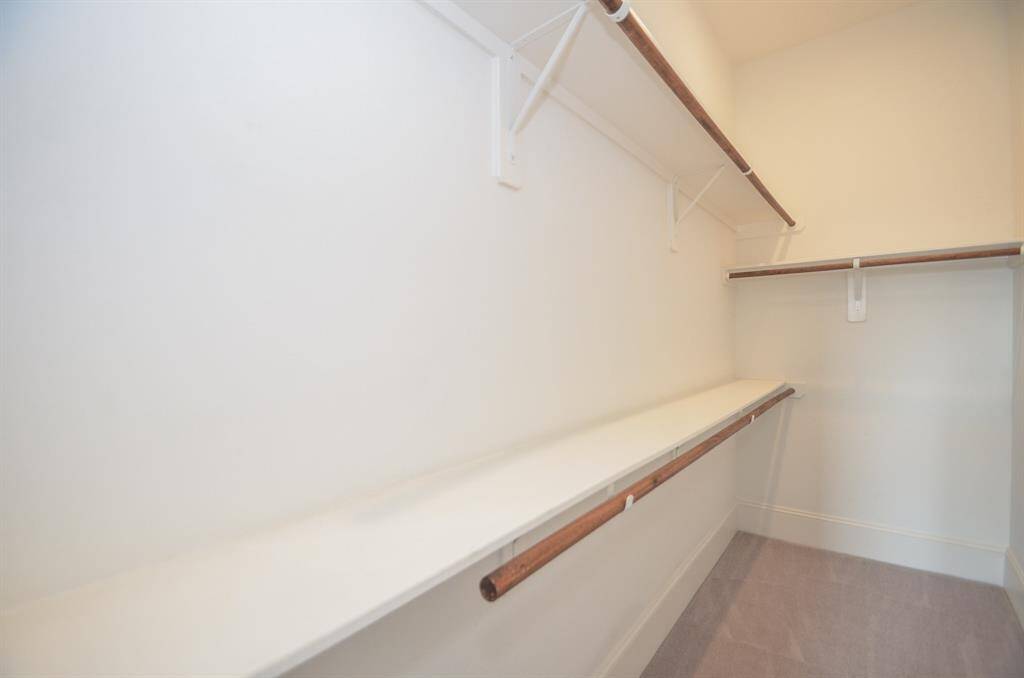 One view of the master closet.